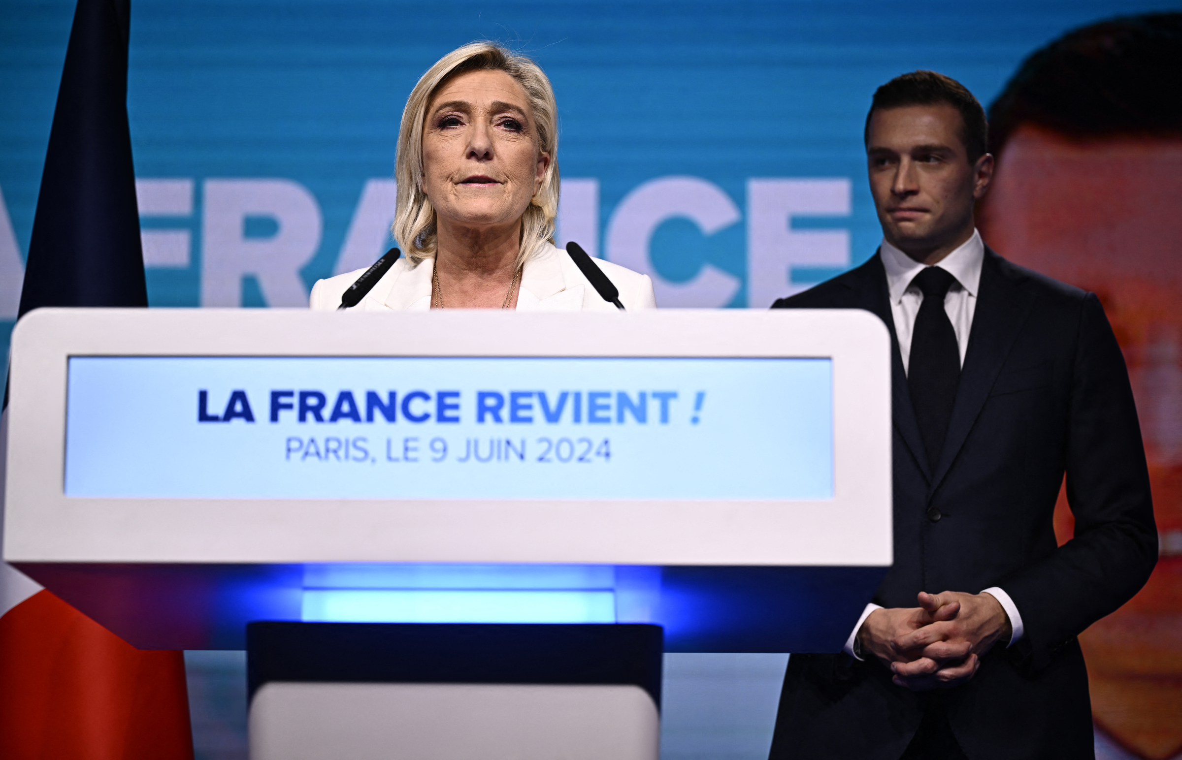 Bà Marine Le Pen (trái) và Chủ tịch đảng RN Jordan Bardella tại sự kiện ở Paris ngày 9/6. Ảnh: AFP